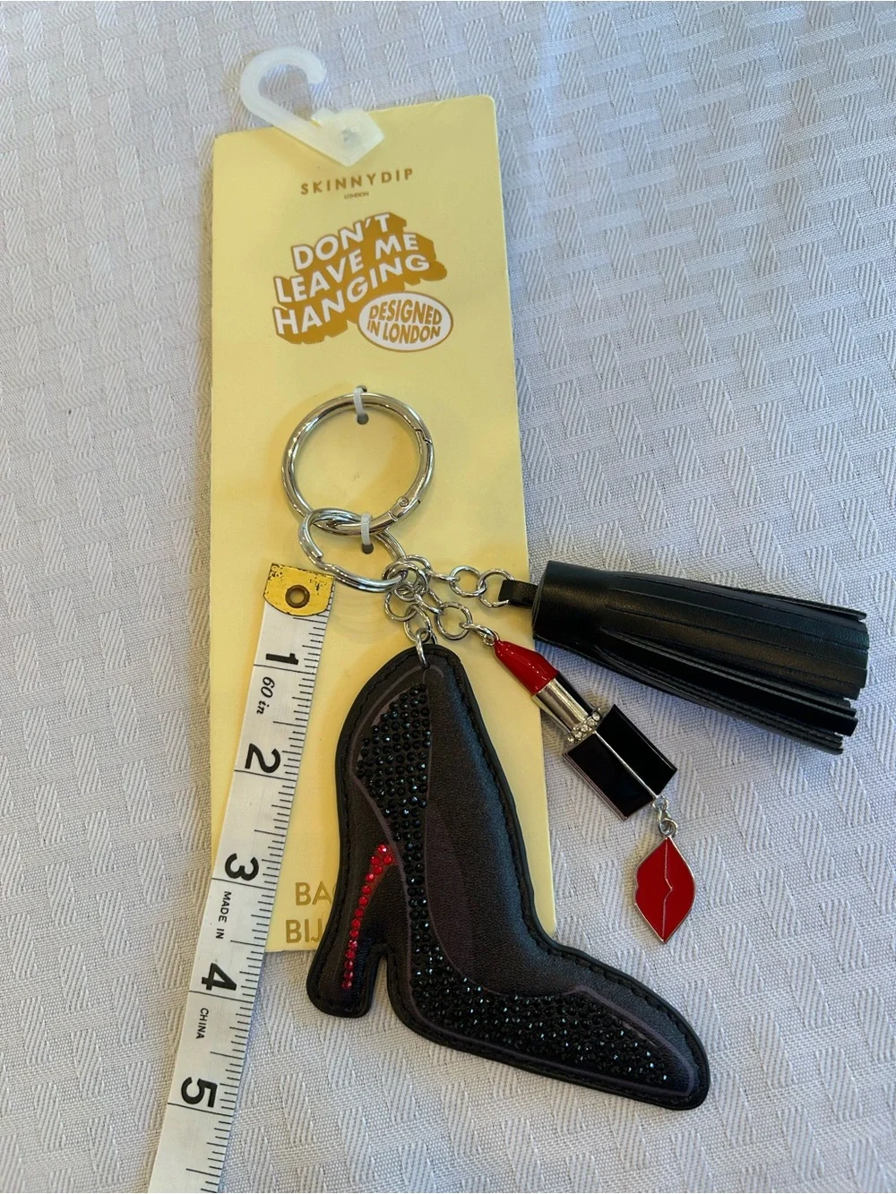 Skinny Dip London Black High Heel Tassel Keychain with Red Lipstick Charm